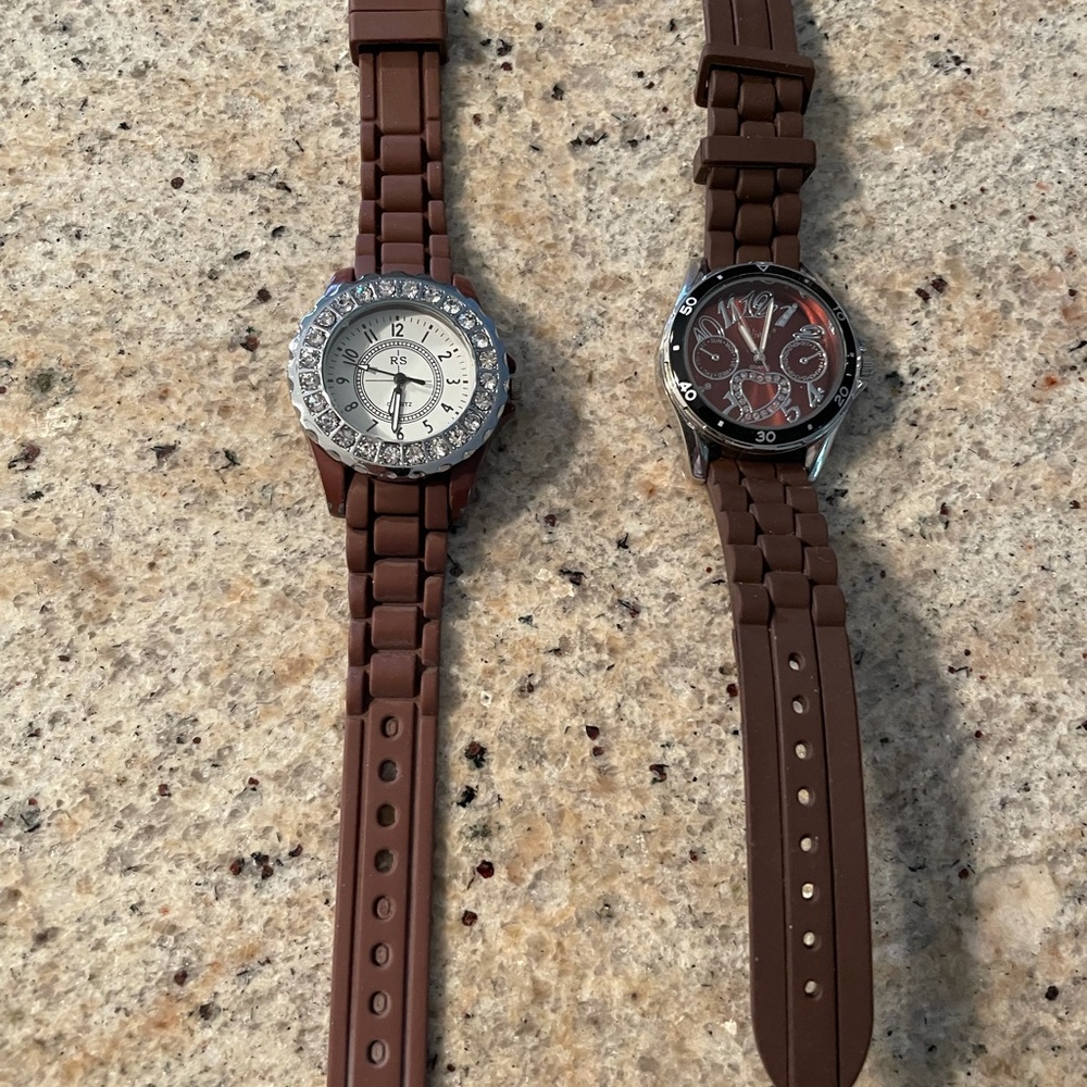 PRE owned brown rubber watches need batteries